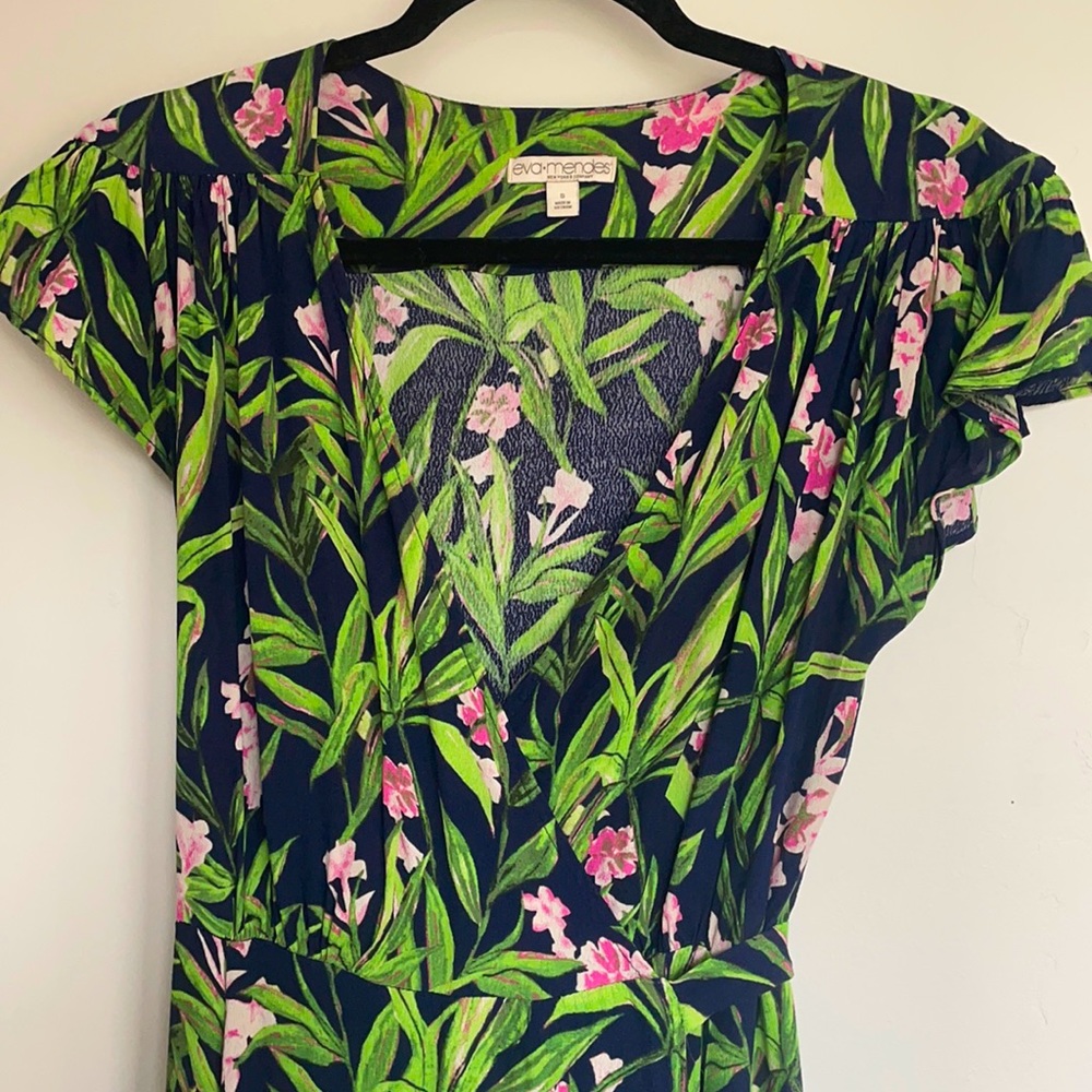 Spring into spring with this super cute floral print wrap dress